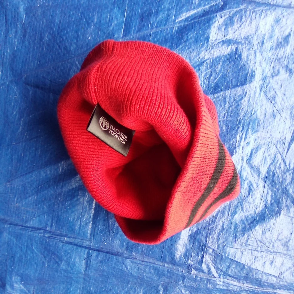 Vibrant Red Knit Hat with Black Accents